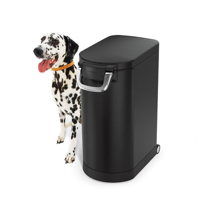 Simplehuman Large Pet Food Can in Matte Black next to Dalmatian, features airtight locking handle and integrated wheels.